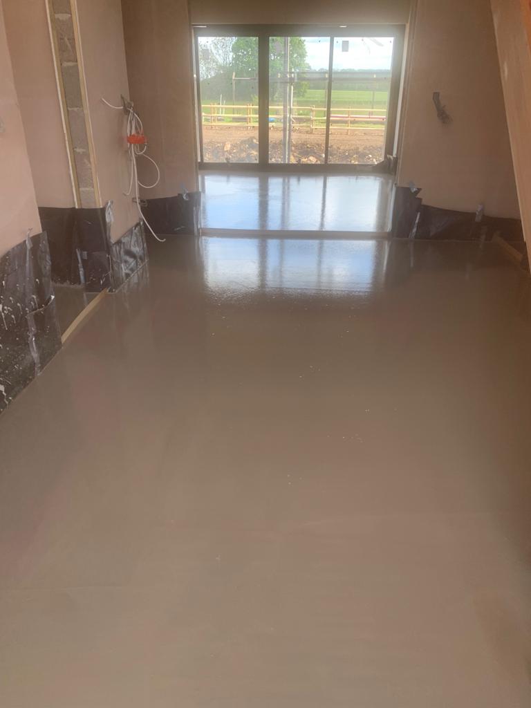 Flowscreed South west - liquid floor screed laying complete